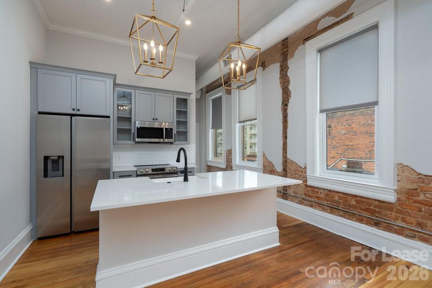 Quiet Luxury in the Heart of Downtown Concord

Stunning one-bedroom, one-bath loft nestled in Downtown Concord’s iconic P.M. Morris Building — timeless architectural charm interwoven with thoughtfully curated upgrades.

The interior boasts elevated finishes, restored original hardwoods, and a sleek, modern kitchen and bath. Soaring ceilings and expansive windows bathe the space in natural light blending airy and intimate.

A spa-inspired bath features a tiled walk-in shower.  The in-unit, full-size washer/dryer lend functional ease. The dedicated parking adds a layer of convenience. While secure access, dedicated mail room and elevator ensure privacy.

Beyond your door, the best of Downtown Concord awaits. Stroll acclaimed local restaurants, boutique shops, craft breweries, and vibrant entertainment.

Lifestyle without compromise — understated, elegant, and entirely yours.

Note: All prospective tenants subject to standardized application process. Pet approvals are conditional. Submission of an application does not guarantee acceptance.