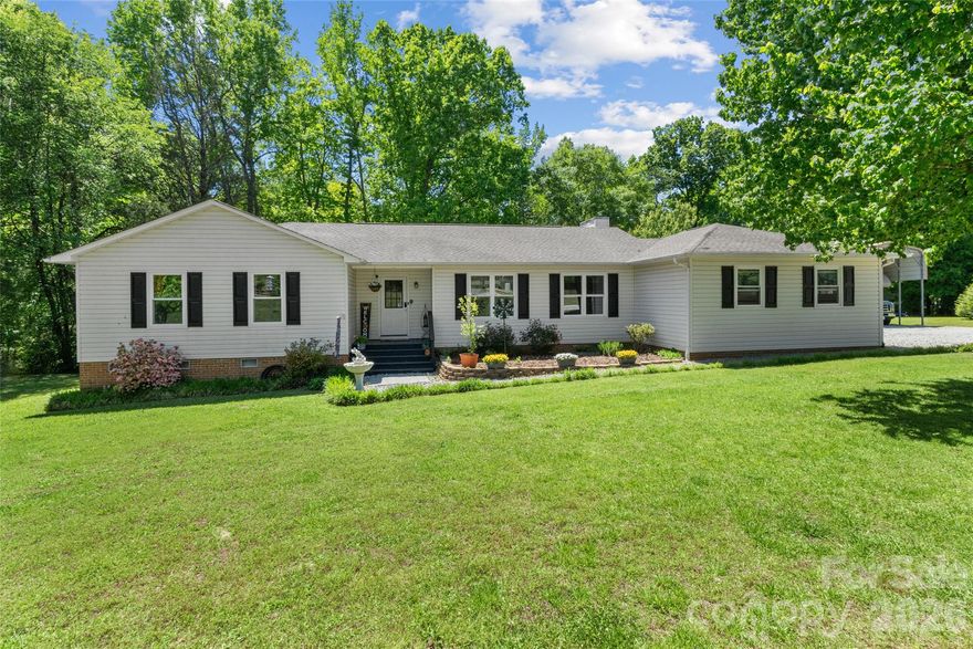 Beautifully maintained, second-owner home located in a highly desirable neighborhood. Move-in ready and full of charm, this property offers an exceptional 1.3-acre outdoor space perfect for relaxing or entertaining.

Enjoy the expansive backyard featuring a spacious deck with a pergola, a fully functional above-ground pool with an attached deck, and a wired shed for added convenience. The home also includes newly installed double-hung windows (2025) and a large RV-sized carport.

Inside, you’ll find a flexible floor plan with an office adjacent to the primary suite—ideal for conversion into a walk-in closet if desired. This home combines comfort, functionality, and outdoor living at its best.