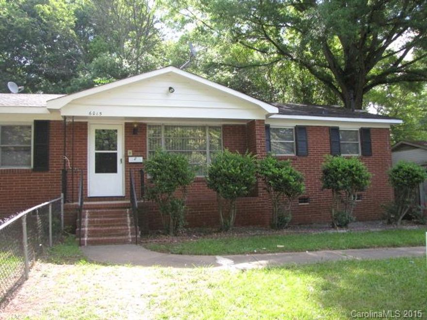 This newly renovated part of a duplex with covered entry has several upgrades. Floor plan includes a foyer that opens to living room, an eat-in kitchen with access to a laundry room and mud room, and two nice sized bedrooms, The kitchen has new counter tops, white cabinetry and matching appliances. Nice tiled walls were added to the full bath with a tub and shower. Other upgrades include paint and flooring. This home with a fenced yard is conveniently located to the light rail and CATS bus line.