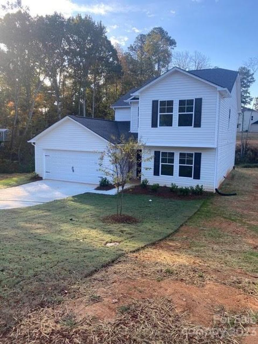 Beautiful 2204 sq ft new construction home located in Lancaster, SC.  This home has an open floor plan with a large flex room downstairs that could easily be used as a bedroom, and a full bath downstairs.  Granite counter tops in the kitchen with island seating.  Also includes a stainless-steel appliance package, which comes with a flat top range, OTR microwave, and dishwasher.  Large living room and dining area.  Upstairs features 4 bedrooms and 2 full bathrooms.  Primary bedroom has vaulted ceiling and 2 walk in closets.  Primary bathroom has separate garden tub and shower, double vanity sinks and a separate water closet.  This home is located near basically all main attractions.