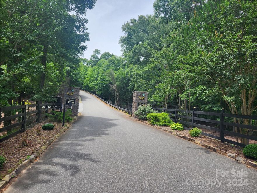 Welcome to Forest Heights, this beautiful 3.59-acre cul-de-sac lot offers a private serene setting the in the gated community of Forest Heights.  This community is within 15 minutes of downtown Marion and approximately 20 minutes to Lake James State Park.  Lake James State Park is nestled in the rolling country base of the Linville Gorge. Lake James has 150-miles of shoreline and is located between the towns of Marion and Morganton. You can enjoy the favorite beach area called "Paddy's Creek" with a designated swimming area, a pavilion with a concession stand and restrooms. The beach at "Paddy's Creek" is open from May to September.  Come build your home in this private country setting close to area amenities and attractions.  Downtown Marion hosts many events and festivals throughout the year which include the WNC Bigfoot Festival, Livermush Festival, Mountain Glory Festival, and the Christmas Parade.