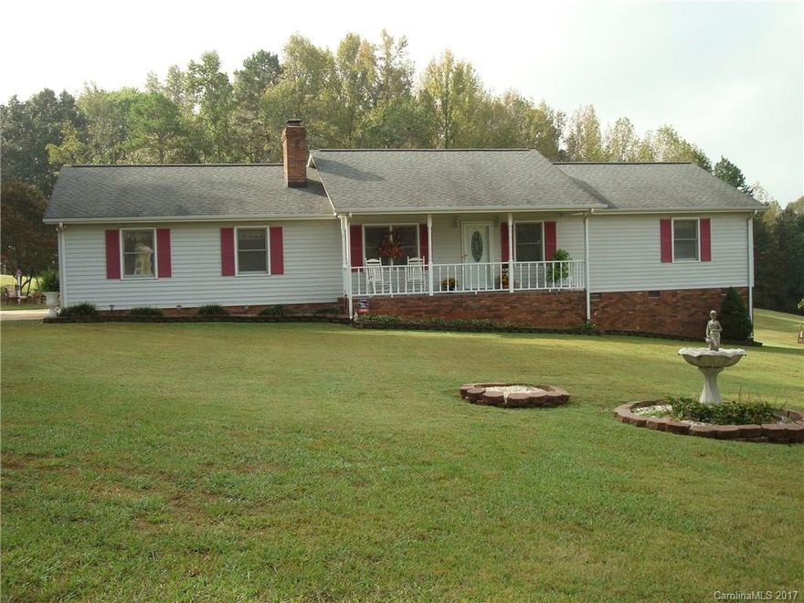 Very nice ranch with 1.45 acres, lots of updates, sunroom, gas fireplace in living room, large master bedrooom, hall bath has double sinks, 2 car garage with utility room, metal carport in back yard for parking equipment and utility building, pretty landscaped yard, the sunroom square footage of 144" is included in the total sf,  just off dallas cherryville highway, well kept home, walk in concrete crawl space for storage, a must see.