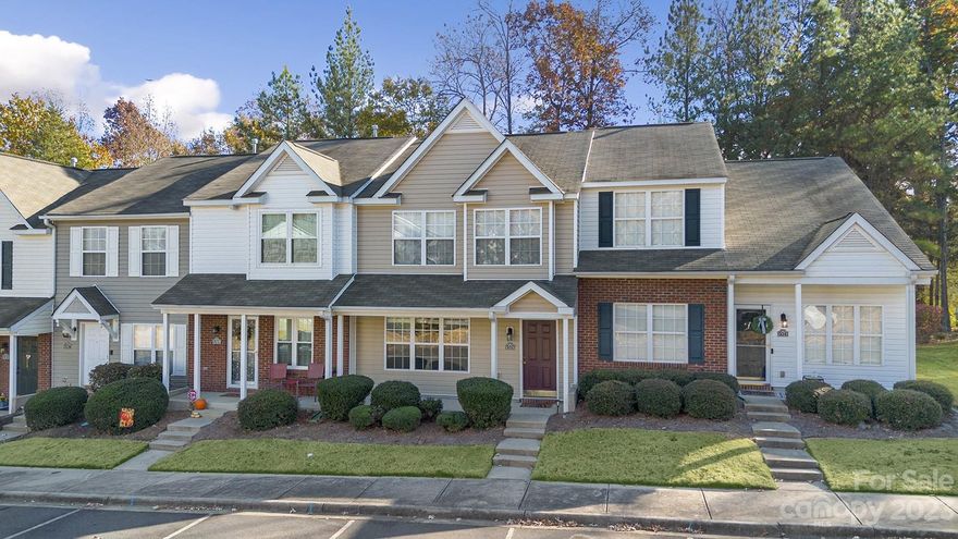 Discover the convenience of Lexington Commons w/ its easy access to I-77, as well as a variety of entertainment and dining options. Unwind during your tranquil evenings on the outdoor living space on the rear patio, complete with space for a grill and extra storage. The back patio provides a secluded view of trees, enhancing your outdoor experience. Inside, the open floorplan showcases a spacious living area, a fully equipped kitchen w/ an abundant of cabinets, and a GR featuring a corner gas FP. This sought-after 2-story townhome seamlessly combines luxury & comfort. Offering 3BD, 2.5 BA. This home achieves the perfect balance of space and convenience. The large laundry room provides a practical and efficient space for your laundering needs, while the expansive pantry ensures you have ample room for storage and organization. Additionally, the unit comes w/ 2 reserved parking spaces for added convenience. Experience the best of both worlds in this lovely townhome at Lexington Commons.