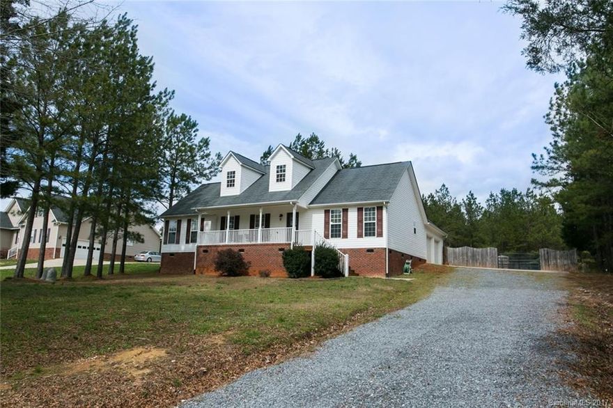 Spectacular four bedroom, two bathroom home in York County.  This home is move in ready and the perfect home for anybody who wants a quiet home within minutes of Rock Hill and Charlotte.  Large family room w/gas logs and surround sound.  Tons of storage in the walk-up attic.  New flooring throughout the first floor. Country living with 6.43 acres with about 5 of that being naturally wooded.  Large barn-style shed in the back yard for all the tools and toys.  Great property for a country retreat.