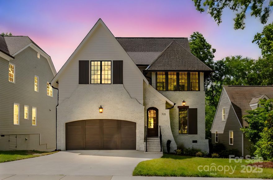 Style, quality, and convenience combine in this curated Cotswold build. Offering over 4,700 square feet of high-quality living, 705 McAlway Road welcomes guests with a gracious entry hall, featuring a first-floor bedroom or office option with full bath with zero-entry shower. The spacious living room boasts a fireplace, built-ins, and beamed ceiling, seamlessly connecting to the chef’s kitchen with professional refrigerator/freezer, 48-inch Thermador gas range, and a large island. The light-filled dining room overlooks the deck, ideal for al fresco meals. A drop zone with pet station and oversized garage add daily convenience. Upstairs, you’ll find four bedrooms and three baths, including a luxurious primary suite with tray ceiling, spa-like bath with soaking tub and custom tile shower, and an impressive closet/dressing room. The top floor is designed for gathering and versatility, offering a bonus room with bar, media/theatre space, office or gym option, and a powder room. Outdoor living includes a back porch with fireplace and a lower-level terrace overlooking the fenced backyard. Builder offering a grilling station with beverage refrigerator, with contract in October. Welcome home!