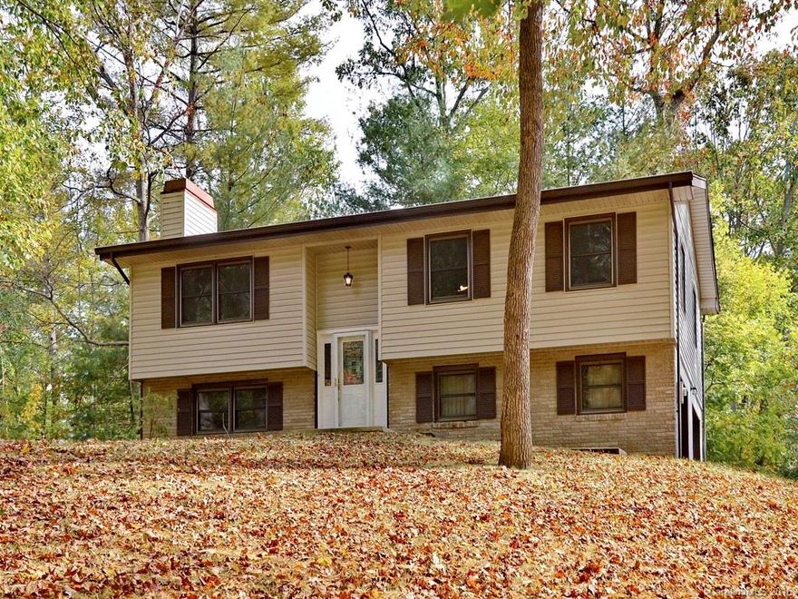 Perched upon a small knoll in the cul-de-sac, this three bedroom, 2 bath home is ready for you to make it yours!  All new beautiful wood floors, brand new stainless steel appliances, some new lighting, tile in bathrooms, wood burning fireplace in lower level family room.  Oversized two car garage.  Newer back deck.  Convenient to everything