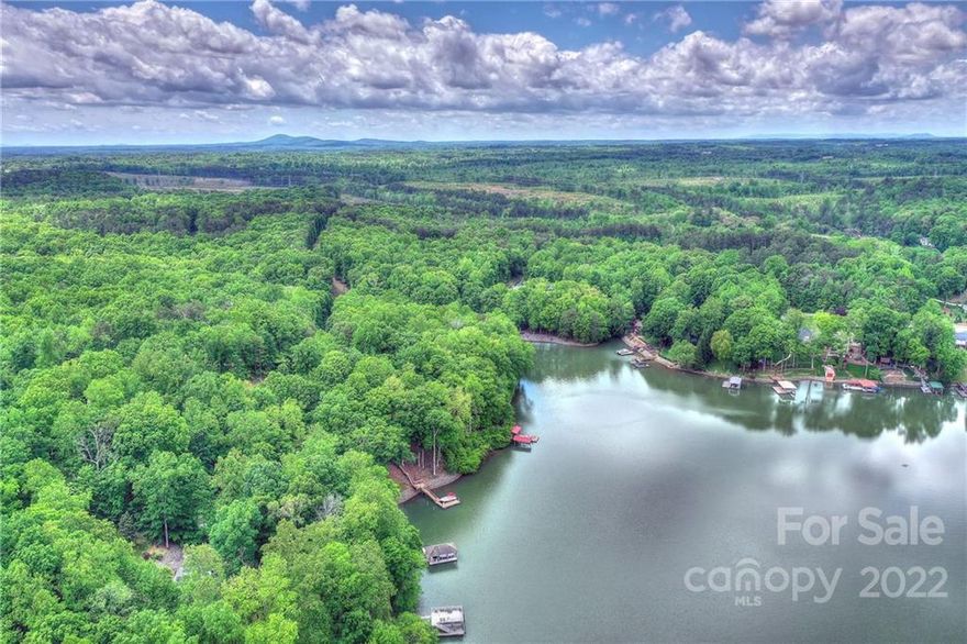 Sherrills Ford Acreage !!  99.75 acres with access from Mollys Backbone and Azalea Road.  Six separate parcels (see plat attached)   Includes Parcels 461901170673,461901368140,461901266940,461901165850,461901270023,461901260522
See restrictions in attachments pertaining to Parcel 461901266940 (60.02 acres).