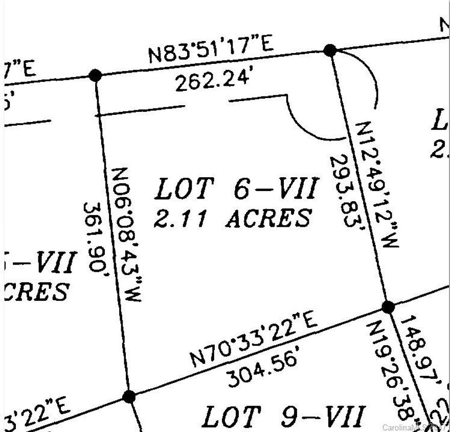 2.11 Acre Vacant lot in gated community. Build your mountain get away or primary residence. Community features private fishing/paddling lake w/ dock & boardwalk, hiking trails, community pool & a creek side park w/ grills & picnic tables. Minimum SF to build. Refer to restrictions. Well and Septic required. Close to I40. There are 35 lots listed at $1800 each. Phase VII doesn't have roads yet.