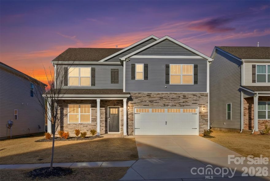 Welcome to 8232 Kennesaw Drive, a beautifully maintained home in the sought-after Nolen Farm community that is the only five bedroom home currently on the market at the time of listing. Not only does this property feature a downstairs bedroom with a full bathroom adjacent, ideal for a guest retreat, but the well-thought out Hayden K floor plan also has a dedicated first floor office with glass French doors and a versatile loft upstairs to go alongside the other four bedrooms, two full baths and laundry room. With a large two-car garage and one of the most desirable lots on Kennesaw Drive, backing to peaceful wooded views, this home surely won't last long. 

The main level features an open living area filled with natural light, a well-appointed kitchen that flows into a dining space and a large living room with a gas fireplace. Upstairs, the spacious primary suite provides a private retreat, complemented by three additional bedrooms and a third full bath. Step outside to a fully fenced backyard that offers privacy, space to relax, and room to play, all enhanced by the quiet wooded backdrop - a rarity in a new construction neighborhood where the expectation is often a yard that blends into three neighbors. 

A well-planned community, Nolen Farm has every amenity that the modern buyer is looking for, including a clubhouse, outdoor pool, dog parks, walking trails, playgrounds, sand volleyball courts, pickleball and tennis courts. Less than 7 miles from downtown Belmont, and under 5 miles to Gaston Day School, Gaston Country Club and even closer to Lake Wylie, this neighborhood is a dream location and value with all of this for just under $430K.