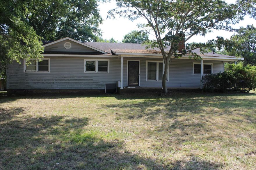 A rare find... a house in Locust with 2+ acres. Home needs updates and seller is selling house "as is". Metal building does not convey. Do not open sliding doors on the back of the house. Glass has been shattered and glass will fall. Gray storage building does not convey. See attachment for deeded easement. We highly recommend the buyers to have the land surveyed to validate acreage is correct... measurements from GIS does not match the deed description. Seller is selling the house in as is condition...she will not be making any repairs.