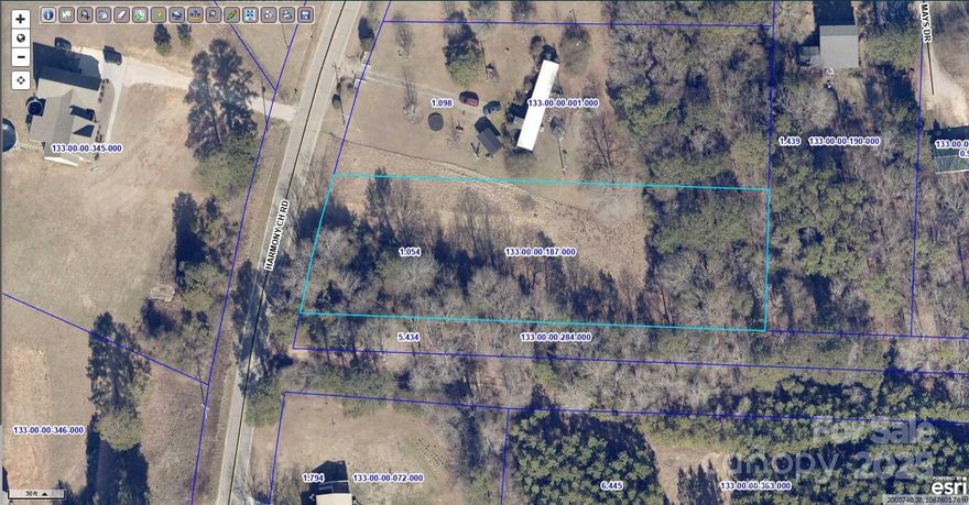+/- 1.054 Acres for sale on Harmony Church Road. This lot is partially wooded and partially cleared. There is +/- 120 ft. of road frontage and is zoned R-2 suitable for residential use. This parcel is located within the Lewisville School District.