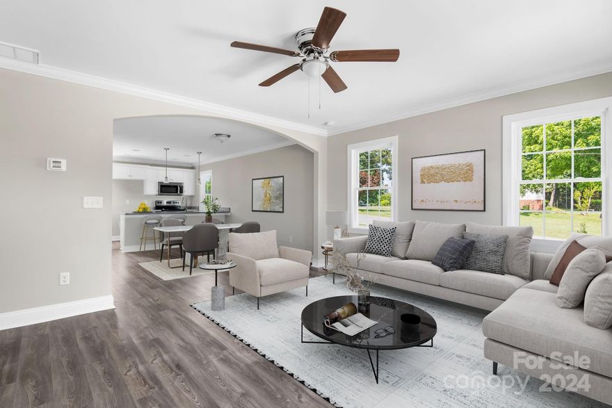 Come tour this stunning new construction home conveniently located on Snow Creek Road. The main level features an open floor plan complete with a great entertaining space living room/dining area which opens to the kitchen. The sunny breakfast bar is a great spot for morning coffee! A convenient half bath is also on this level. The upstairs offers 3 bedrooms, plus a bright full bath with dual vanities. Please note: The photos of this home have been virtually staged with furniture and decor to give buyers an idea of space and furniture arrangement. This home will be completed in 30 days and will also include privacy fenced in backyard.