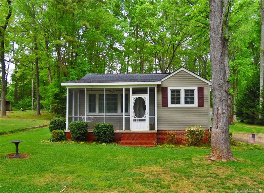 Charming and inviting home near high school and historic downtown York! Beautifully updated while keeping much of the original character, this 2 BR/2 BA home features a large eat-in kitchen, cozy family room, and a peaceful expansive lot with storage building.  Master has his/hers closets and a master bath with double sinks.  Just minutes to the shores of Lake Wylie!