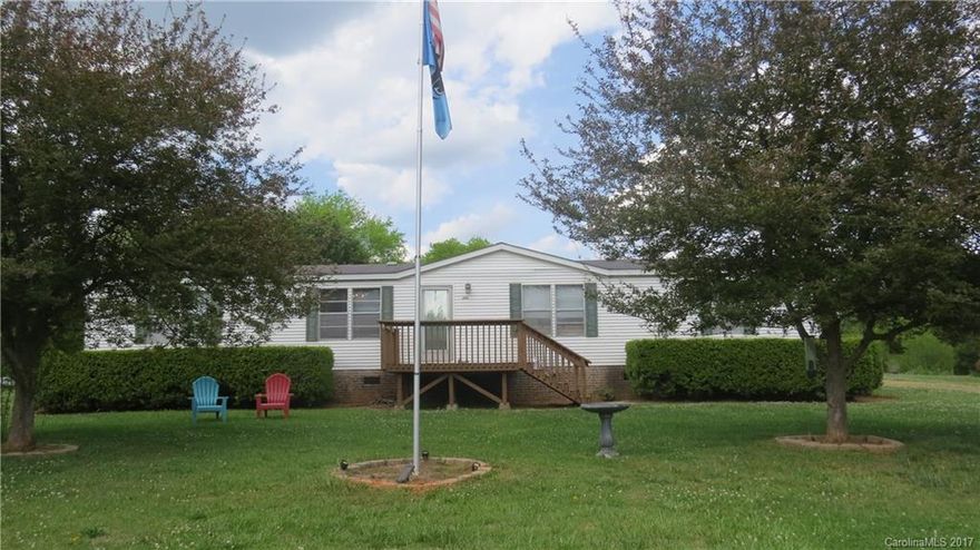 Large inviting front deck leads into a well maintained 3 bed, 2 bath home. Large kitchen with breakfast bar flows into great room with vaulted ceiling. Split bedroom plan, Master bed w/garden tub. 2 car carport- (20x21) with added storage shed ( 12x16). Back patio with small fence for your furry family, over 1 acre of beautiful land well beyond the fence complete with fruit trees, apple, pecan and peach. MULTIPLE OFFERS RECEIVED, Calling for highest and best by 3:00 Tuesday 4/25/17