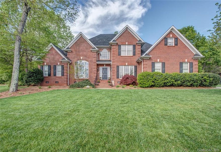 Exquisite custom built home perfectly landscaped & nestled in a quiet cul-de-sac - move in ready condition! Elegant formal dining & living rooms, 2 story great room opens to huge chef's kitchen with all the upgrades. Hardwood floors throughout entire home, tiled baths & laundry. Unreal master suite with stunning bath and private screened porch. Bedrm 2 w/full bath also on main. Large living space/bonus room upstairs. New HVAC systems. Private, meticulously manicured backyard. Shows like a model!