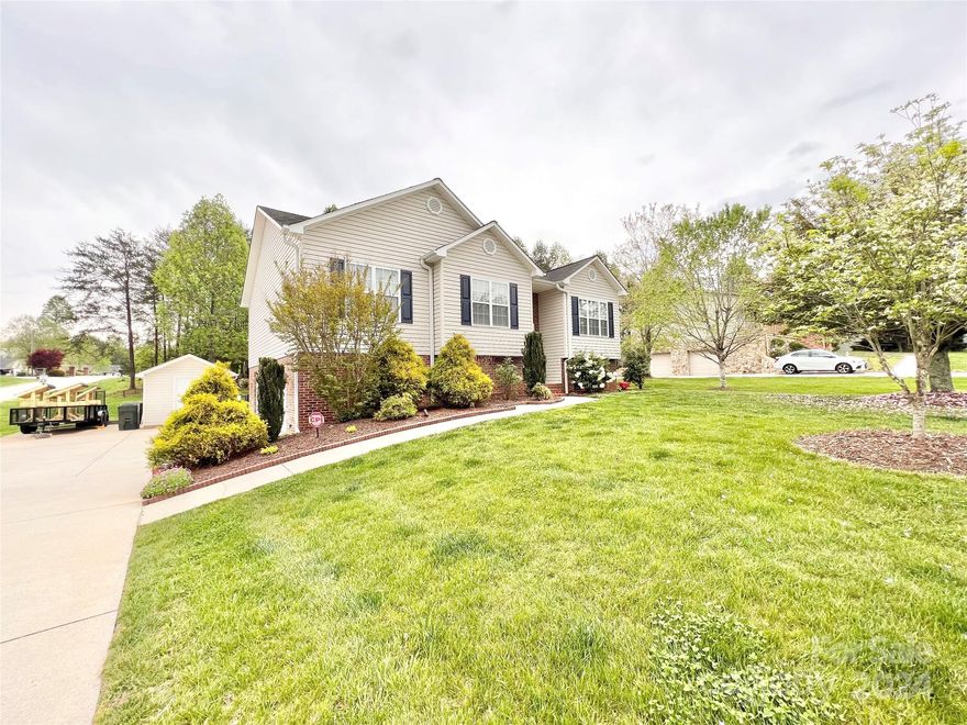 DEER CREEK SUBDIVISION!! FANTASTIC LOCATION with this updgraded home! Excellent Curb Appeal! New GRANITE countertops, new appliances, freshly painted and more! Spacious lovely home featuring 3 bedrooms on the main floor along with 2 separate rooms on the lower level to be used as you chose...so many possibilities! The primary bedroom has a large bathroom with 2 large walk-in closets, access to the main level laundry/mud room (with utility sink and built-in dog crates!!!). Deck in back overlooking the large fenced-in yard. Separate shed located next to the driveway. Double parking. South Caldwell District. Conveniently located off Hwy 321 with a short drive to Hickory! Move-in ready! More pics to follow!