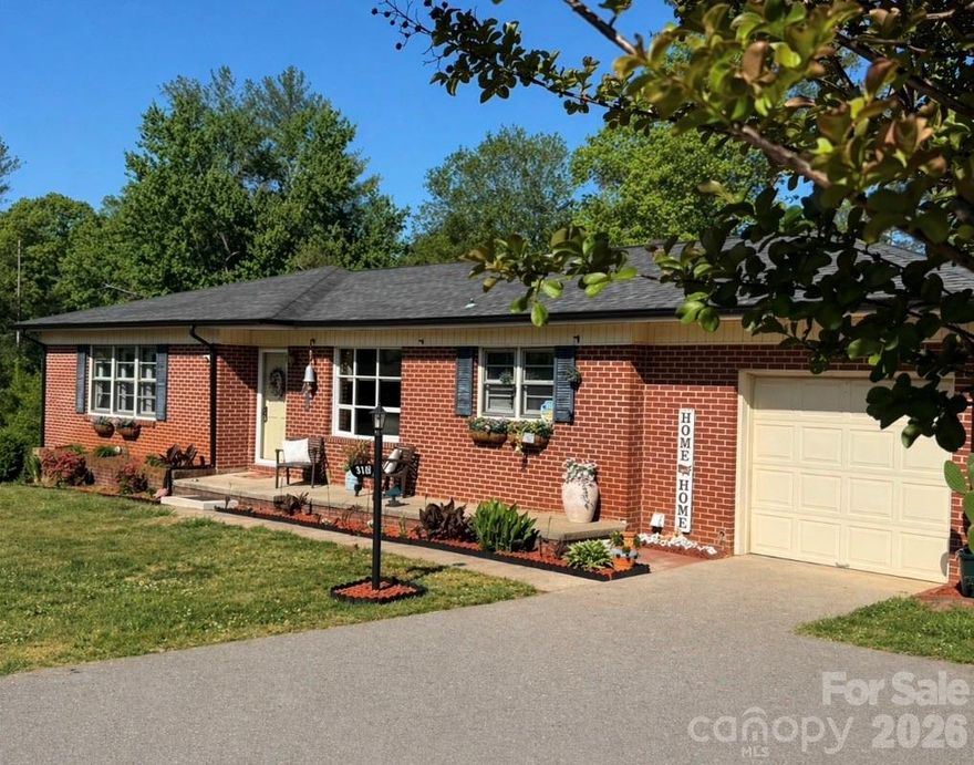 One Level All Brick Ranch Home with ACREAGE, BARN and Guest House/Income Property!!! Convenient to Lenoir and Morganton, this Home features a Low Maintenance Brick Exterior, Newer Heat Pump, Some Replacement Windows and Newer Appliances! Guest House/Garage would be a perfect In Law Suite or could be rented for Extra Income! It has a New Mini Split, a New On Demand Hot Water Heater, and recently rented for $600 per month! 
A beautiful field, perfect for gardening, leads to a 2 Level Rustic Barn! Step back in time and see tools still present, from decades of hard work! 
Inside the main house, enjoy many updates! Plumbing, Lighting and Electrical updates, Additional Insulation, Refinished Hardwood Floors, Remodeled Main Bathroom, Additional Half Bathroom, Open Floor Plan, and Much More! An Updated Kitchen is conveniently located off of the garage and has Painted Cabinetry, Newer Appliances, Beautiful Wood Counter tops, and is open to the Dining and Living Room! Hardwood floors lead to a Large Living Room with a Secret Bookshelf Passage to a Nicely Sized Bedroom and Adjoining Half Bathroom! 2 Additional Bedrooms on this level. A Fully Remodeled Main Bathroom will Catch Your Eye with Bead board walls, Tile Floor and Brass Finishings! Glorified Crawl Space, feels much more like a Full Basement!
If You're Looking For a Property That Has It All....Hurry to See This One and Make it Yours Today!