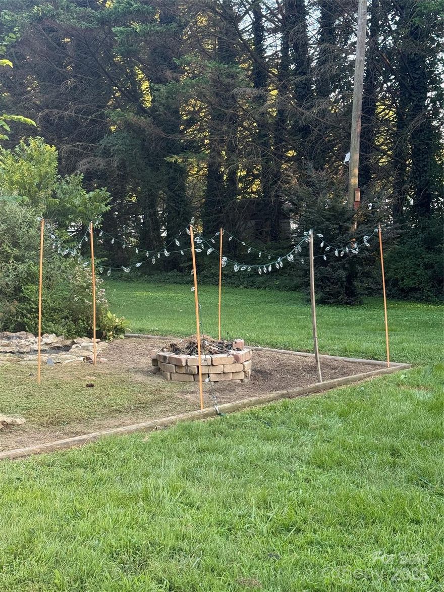 Charming 2-bedroom, 1-bath home in city limits with plenty of space and character! 

The backyard offers a peaceful retreat with a workshop and storage shed, a spacious yard, and plenty of room for gardening or birdwatching. A wonderful opportunity to enjoy both convenience and privacy!      

This home features an extra-large kitchen and dining area that flows into a cozy living room. New paint throughout.  An enclosed front porch provides a great spot to relax, while the patio area is perfect for watching the world go by.  Additional spaces include a mudroom, laundry room, and a bonus room ideal for an office or extra storage.