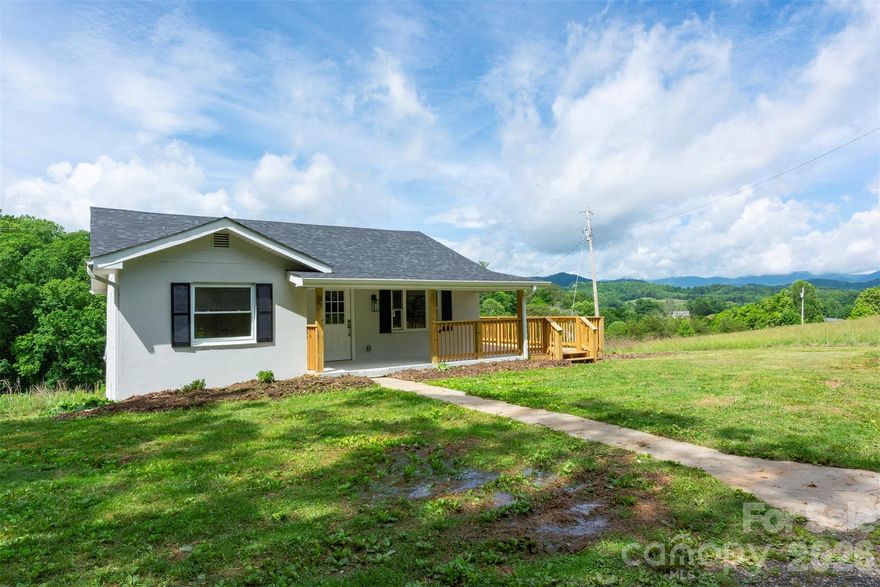 Experience the perfect blend of modern comfort and mountain charm in this fully renovated 3-bedroom, 2-bath home on over an acre, just minutes from downtown. With breathtaking long-range mountain views, this home offers a peaceful, serene setting along with the perfect balance of tranquility and convenience.

Inside, you’ll find an inviting open floor plan with new flooring, fresh paint, and brand-new stainless steel appliances. The spacious primary suite includes a beautifully renovated bathroom, while two additional bedrooms provide comfort and flexibility for family, guests, or a home office.

Step outside to enjoy the newly built deck, perfect for entertaining or simply soaking in the stunning mountain scenery. The unfinished basement, with both interior and exterior access, provides abundant storage and is well-suited for a workshop or additional workspace.

Great location with shopping, restaurants, and everyday essentials just minutes away—make this your home today!