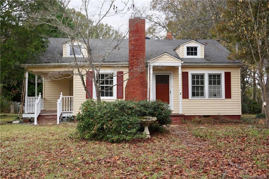 Charming ranch home located close to downtown.  Home is sold AS IS. Large kitchen and bedrooms with tons of possibilities.  Space in basement offers many options for buyer.