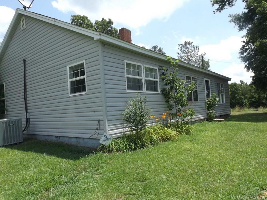 A home in the country!  Privacy in a country home on over a acre surrounded by farmland.  TLC is needed as rehab was started but not completed.  A great opportunity for a fixer upper project but priced accordingly.  3 bedrooms and two full baths with outside storage.  Huge eat in kitchen with central HVAC.