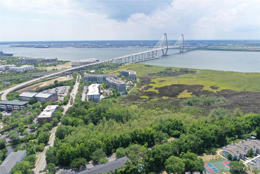 Incredible Location - Property is a Very Scenic Marsh-Front 10-acre parcel located near the base of the Arthur Ravenel, Jr. Bridge, on Wingo Way.  This is one of the last available parcels in this high-traffic area of Mount Pleasant.   It is zoned mixed commercial and could possibly work for retail, dining, lodging, an office building, or a scenic park. The acreage is in-between The Tides Condominium Complex and Sleep Inn, on Wingo Way.  Surrounded by other hotels and local businesses, this parcel is well positioned to capitalize on future growth and development.  It is believed that the buildable portion of the property is somewhere between 1/3 to 1/2 acre. There is a 2nd area f high ground by the Sleep Inn, but most likely inaccessible without permission from the adjacent neighbor. The 2 proposed buildable areas are identified by the 2 circles in a couple of the images.  All major utilities available.  The wetlands are made up of both freshwater and saltwater.