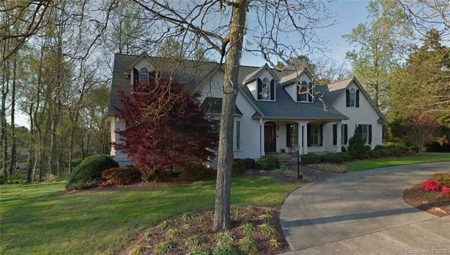 Well kept stucco house with plenty of room for expansion.  Features master bedroom on the main level, large manicured yard, formal living room, family room, formal dining room, large custom designed kitchen, butler's pantry, elevator, basement has a large office with a fireplace & an outside entrance.  Basement is only partially finished & the attic is unfinished but is pre-wired and pre-plumbed to easily grow the home. Convenient to shopping & hospital.