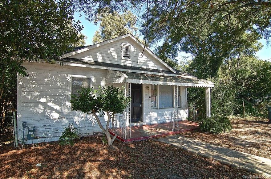 Plenty of opportunity in this turn of the century mill home.  Several Flexible spaces with living areas and bedrooms on main and in basement.  Would make a great income property and also great for Owner Occupant.  Attractive and Expansive rear yard.