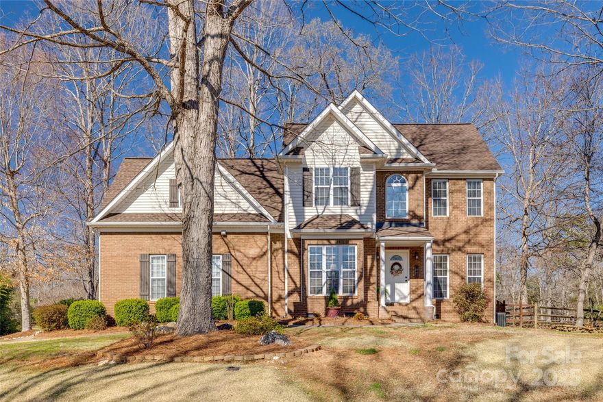 Welcome home to this charming 4-bedroom, 2.5-bathroom traditional-style retreat where warmth and functionality come together! The heart of the home is the kitchen, seamlessly connecting to the breakfast nook and formal dining room—perfect for gatherings. Just off the foyer, French doors open to a spacious office, ideal for work or study. The inviting living room features a cozy gas fireplace, creating a perfect space for relaxation. Upstairs, you’ll find two secondary bedrooms, a versatile bedroom/bonus room, and a serene owner’s suite with dual split vanities, a garden tub, and a separate shower. Step outside to the covered screened porch, overlooking a fully fenced backyard with a 12x10 shed, offering plenty of space for outdoor enjoyment. Includes ventilation systems that automatically open and close vents based on temperature and humidity. Ideal location within minutes of shopping, restaurants, and highway access. Don’t miss the opportunity to make this beautiful home yours.