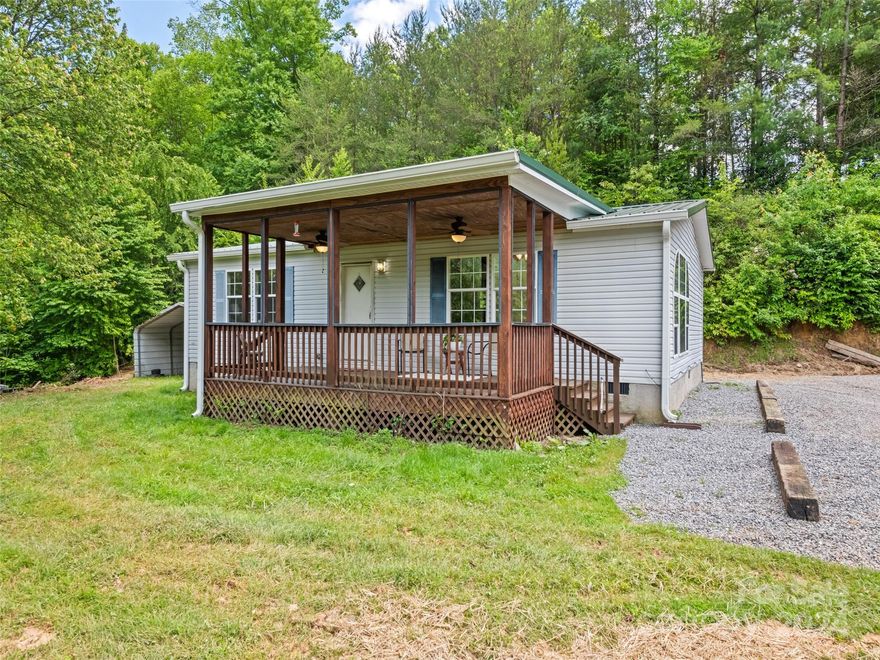Investors looking for STR or LTR! Families starting out fresh! Retiring to the Mountains? Improved 2002' DW home with some lush green yard and trees on an accommodating 1.26 acres to start your family or retire in an easily accessible home that will be low maintenance! This home has undergone several improvements to allow you to make it your own slice of heaven in the Blue Ridge Mountains. The home offers a split floor plan, Master for you with HW floors, large bath and walk in closet & additional BR for guests with fresh paint throughout, new flooring, newer metal roof, some new lighting and ceiling fans, new bathtub in guest bath, deeply cleaned to feel fresh and new! Outside you will enjoy the large front covered porch, fresh grading and grass planting, large metal shed for storing yard & garden tools and extra large newly graveled parking area. Canton with eateries, schools, and grocery stops 10 min. Waynesville 15 min. Asheville 35 min.