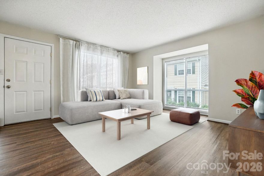 Welcome Home to this Beautifully Updated End-Unit Condo, Nestled in the Desirable Ferrington Place Community. Backing up to a Peaceful Wooded Area, this 2-bedroom, 1.5-bath Home offers Both Comfort and Style in a Quiet, Natural Setting. Bright and Inviting Eat-in Kitchen featuring Sleek Granite Countertops, Freshly Painted White Cabinetry, and WiFi enabled Stainless Steel Appliances — Perfect for Everyday Living or Entertaining. The Entire Home Boasts Luxury Vinyl Plank (LVP) Flooring—No Carpet anywhere! Both Bathrooms have been Tastefully Upgraded with Modern Vanities, Providing a Fresh, Contemporary Feel. Enjoy peace of mind with a brand-new HVAC system installed in August 2024.  Don't Miss Out on This Rare Opportunity to Own in Ferrington Place!!!