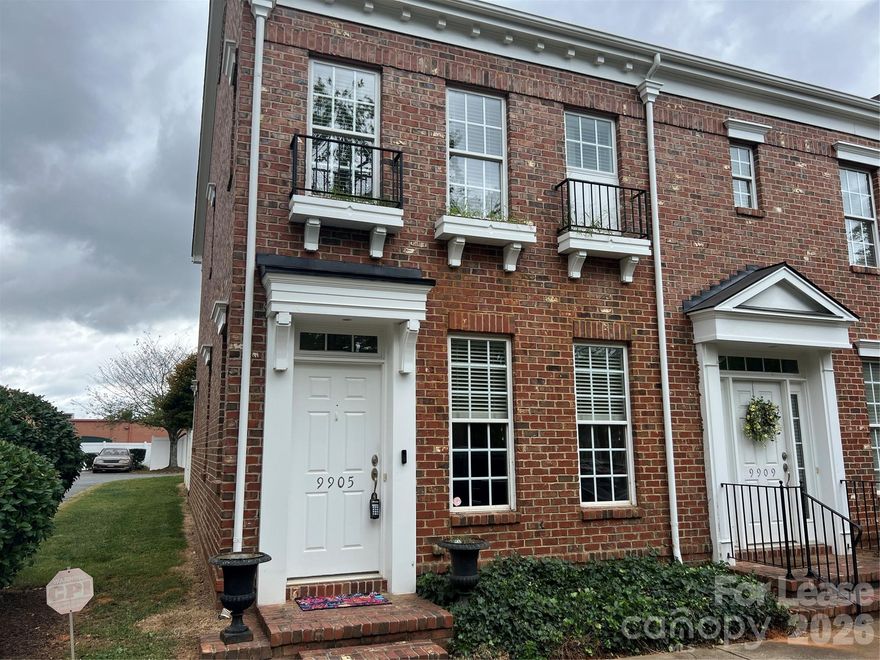Charleston Style full brick townhome in the highly sought-after section of Rosedale with 2 bedroom and 2.5 bath. This was freshly painted. Living room with crown molding and cozy gas log fireplace too. Kitchen with granite countertops and granite backsplash, stainless steel appliances and refrigerator. The kitchen flows into breakfasted area. Lovely 2 master bedrooms up with large walk-in closets and own private bathrooms. Home has been pre-wired for cable. Private patio courtyard and fenced yard lead to a detached oversized 1 car garage. Garage has plenty of storage space. Washer/Dryer and Kitchen fridge included too. Convenient to I-77 and Lake Norman and within walking distance to shopping, bank, restaurants also close to hospital and schools.