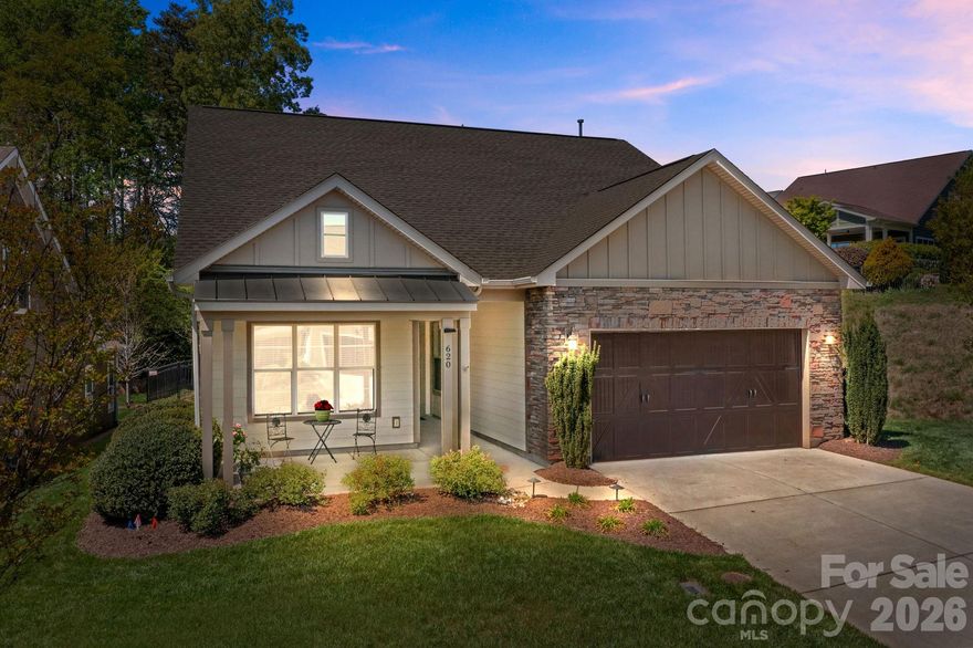 Step into the lifestyle you have been dreaming of in this beautifully appointed ranch home nestled within the sought after 55+ gated community of Trilogy Lake Norman. More than just a home, this is a destination where every day feels like a retreat. From the moment you arrive, the inviting front porch welcomes you in and sets the tone for the warmth and elegance found throughout.

Life in Trilogy is truly unmatched, offering extraordinary resort style amenities centered around an impressive clubhouse featuring both indoor and outdoor pools, tennis and pickleball courts, private dining spaces, wine tasting rooms, sports viewing lounges/card rooms and the beloved on site restaurant, The Foundry. As an added bonus, ownership includes membership to Freedom Boat Club, giving you effortless access to enjoy all the beauty and recreation of Lake Norman without the hassle of boat ownership.

Inside, this Shea Homes Ramsey floor plan has been thoughtfully designed for both comfort and connection. Just off the foyer, a versatile office or flex space with a beautiful wood accent wall creates the perfect setting for working from home, hobbies or a cozy den. The adjacent hallway leads to two secondary bedrooms and a shared full bath. The front bedroom is filled with natural light from its well placed windows.

As you continue through the home, the space opens beautifully into the main living areas where every room feels connected yet intentionally defined. The family room is anchored by a stunning floor to ceiling, stacked stone gas fireplace that creates a warm and inviting focal point. Surround sound speakers in both the living room and rear porch, making this home perfect for entertaining inside and out.

The chef’s kitchen is truly exceptional and designed to inspire, featuring upgraded maple cabinetry, granite countertops, a striking glass tile backsplash, stainless steel double oven/microwave combination, gas cooktop, and a spacious center island with a gorgeous farmhouse apron sink. Thoughtful storage solutions include roll out lower cabinet shelving, a pantry cabinet and an additional walk-in pantry. The dining room offers an ideal setting for gatherings with friends and family, conveniently located near the kitchen and outdoor living space. 

The primary suite is a peaceful retreat, situated at the back of the home, where large windows fill the room with beautiful natural light. Room darkening blinds are already in place for those mornings when sleeping in sounds perfect. The luxurious primary bath feels like a private spa, complete with an expansive vanity nearly ten feet long with storage and a dedicated makeup counter. A second vanity sits opposite alongside a beautifully tiled shower with bench seating.

The laundry room offers even more thoughtful functionality with an impressive smart space featuring extensive cabinetry, countertop workspace, desk area, and rough plumbing already in place for a future utility sink.

Step outside to the extended covered porch and instantly feel at home. Designed for year round enjoyment, this outdoor living space features a cozy gas fireplace and ample room for gathering on the wraparound porch while enjoying the gorgeous Carolina weather. The fenced backyard is enhanced with mature landscaping and offers a lovely backdrop for relaxing or gathering with family and friends with no neighbor on one side or behind the home.

Every detail has been carefully considered, from the exterior landscape lighting and strategically placed outlets for holiday/accent lighting to the upgraded garage outlet for a freezer, an additional garage circuit with potential for RV power conversion, ceiling mounted storage, and irrigation on a separate water meter for cost efficiency.

This is more than a home. It is a lifestyle of comfort, connection, and effortless enjoyment in one of Lake Norman’s most desirable active adult communities. Visit www.mytrilogylife.com/lakenorman/ for neighborhood info.