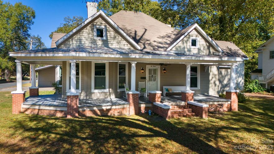 HISTORIC GEM! CHARMING STREET! TIMELESS CHARACTER!  This classic home offers quality features such as tall ceilings, porches galore and real hardwoods!  You will enjoy entertaining in the huge farmhouse kitchen with lots of natural light and 2 walk in pantries.  The spacious dining room has built ins, a wall of windows and is positioned right off the kitchen, living room and entry hall; which is large enough for a music area, office space/ play area/pet space.  The 3 bedrooms are very large and have 2 full bathrooms along with an attached office or exercise room. Updates include:  new flooring in bathroom, hardwoods refinished, painting, HVAC and roof a few years old and added double carport w/ storage.  Very large level lot.... All located in the heart of downtown Clover and walking distance to schools, grocery, restaurants, and shopping.  This is the small-town , good life you have longed for!!
Back on the market at no fault of the sellers - buyers financing fell through.