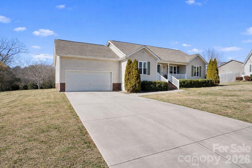Welcome to this one-story easy living home in a quiet cul de sac. Step inside and you will see how this home blends comfort, functionality, privacy, and convenience all in one. Offering a split three-bedroom floorplan, two full bathrooms, a dining room and kitchen, along with a large laundry room, you have all the space to make you feel like you have finally found “the one.” The newer hardwood floors throughout the main living areas and the gas log fireplace create a warm and inviting atmosphere, perfect for relaxing and enjoying the colder months. Outside there is a rocking chair front porch and a beautiful screened in back porch where you can sit and enjoy all of the beautiful landscaping that the Sellers have worked tirelessly on over the years. All year you can enjoy the evergreen trees, and in the Spring and Summer there are gorgeous blooming trees and shrubs such as crepe myrtle, cherry, silver maple, magnolia, knock out roses, holly bushes, spirea, roses of Sharon and more. A nice shed for storage and a two-car garage make for lots of storage space. Updates include: New roof in 2022, double hung windows replaced throughout roughly 2 years ago, and wood flooring. Come check out 921 Hollow Hill Court and be ready to call it HOME!