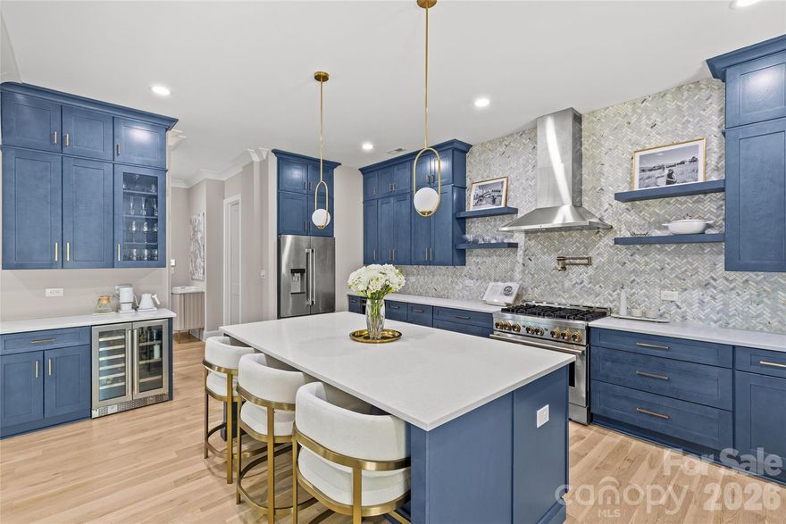 Welcome to 3505 Oakwood Ave, a gorgeous 2023-built home in the highly desirable NoDa neighborhood—move-in ready from day one, and full of upgrades. Upon entry, you'll love the seamless flow between the living, dining, and kitchen areas. The kitchen shines with a huge quartz island, JennAir appliances, and upgraded cabinetry, while smart lighting and motorized shades add everyday ease. Completing the first floor living space is a flexible office or bedroom with attached full bathroom. Continue outside to a charming patio perfectly sized for relaxing or entertaining. Upstairs offers a gorgeous primary suite with a stunning California Custom closet, as well as additional built-in closet storage, and a spa-inspired ensuite. There are two more bedrooms, a full bathroom, and a versatile flex room. The garage is finished with epoxy floors, built-in storage, and universal EV charging.  Additional upgrades include whole-house water filtration, integrated security, and motorized blackout shades — all done for you. Minutes from NoDa's restaurants, breweries, and shops with easy access to Plaza Midwood, Uptown and more!