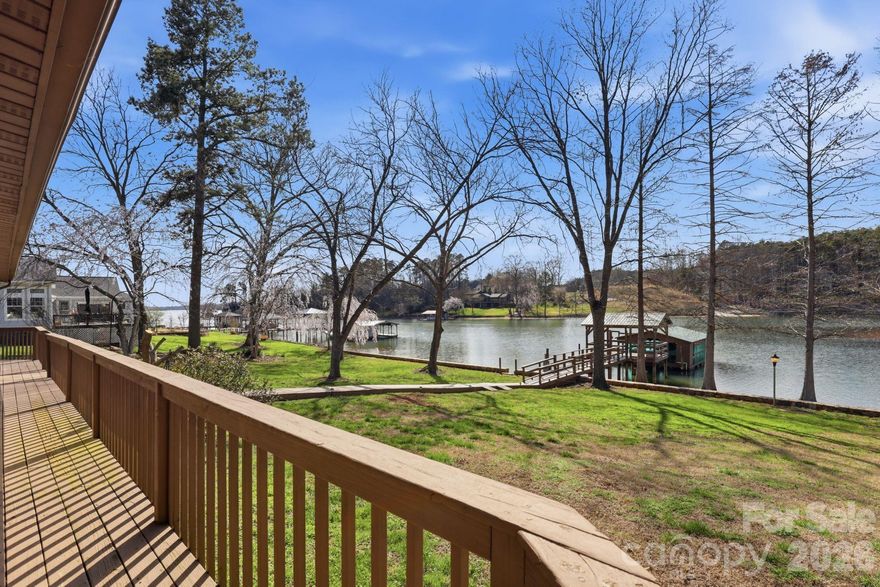 In the market for amazing waterfront lot on LKN? Properties like this are increasingly rare - Sunset views from dock, potential sunrise views in front, level land, deep water, permitted dock with extra slip. . . This ~0.75-acre homesite offers an ideal canvas for a custom lakefront residence. An adjoining ~0.76-acre parcel is also available with full facilities for expanded waterfront acreage or additional VRBO income (see 232 Apache Rd). Fantastic opportunity for investor/builder or private owner to build their private retreat!

Set within a quiet, protected cove, the property offers both privacy and ease. A beautiful stone seawall enhances shoreline integrity and visual appeal. The expansive covered dock includes generous seating, a boat lift, and an additional slip. Designed for immediate enjoyment from day one.

Surrounded by established luxury homes, the setting supports lasting value and prestige. No HOA restrictions. Bring your preferred builder and design without limitation.

The existing ranch home with second living quarters conveys AS-IS. It offers immediate use or relaxed VRBO potential with cosmetic updates.

Just 40 minutes from Charlotte Douglas International Airport, this location offers seamless access by car or boat to refined dining, boutique shopping, and Lake Norman State Park’s outdoor recreation. Experience the setting and imagine the lifestyle that awaits. . .