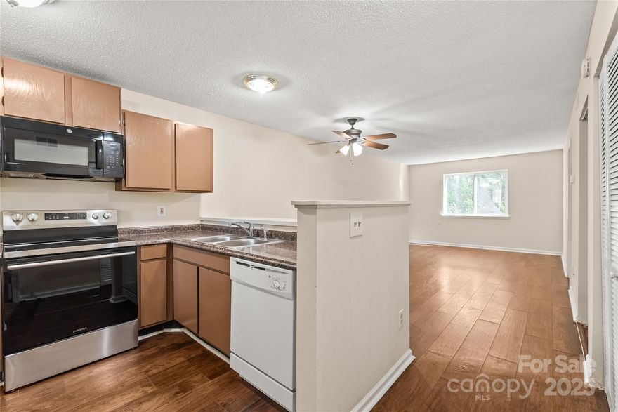 Cheaper than RENT...Time to Become a HOMEOWNER! Beautiful laminate wood flooring throughout! This condo has a GREAT floor plan, two full baths, a kitchen, and a great room. Ideal roommate layout, with each bedroom having bathroom access.  Improvements! ALL BRAND NEW: HVAC system, water heater, microwave and stove. HVAC and Water Heater both came with transferable warranties* The HOA fee covers: Lawn Care, Outside lights, and the master insurance for the buildings.
General outside maintenance such as pot holes, etc. Great location with easy access to I-77, shopping, restaurants, and more. Charlotte Douglas airport is also an easy commute!