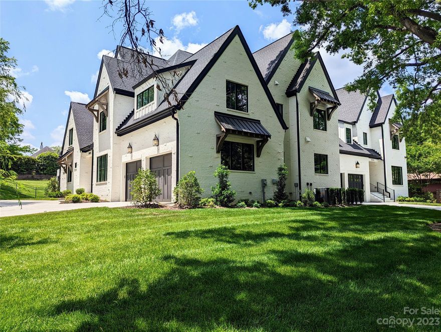 Nestled in the heart of South Park, this charming duet home boasts 4,600 sq ft of living. The very open concept living area is perfect for entertaining guests and spending time with family. A big kitchen with Borghini marble/walnut countertops and GE Monogram. The scullery is a fantastic addition, providing an extra place for meal prep and storage. 2-story family room with 20 ft wide slider doors overlooks a screened-in porch with a motorized screen/fireplace. Primary BDR with vaulted ceilings and big walk-in closet. Huge bonus room with a bar area, sealed crawlspace, 8-zone sprinkler system, tankless water heater, casement windows, cat-6 wiring, white oak flooring throughout, solid wood garage doors, custom built-ins and beams, 17-seer Trane high efficiency HVAC, and fenced-in yard with outdoor kitchen.  Walking through the home, you would never guess it is a townhome.  With big rooms, open floor plan, and lots of natural light, this house feels like a single-family home in and out.