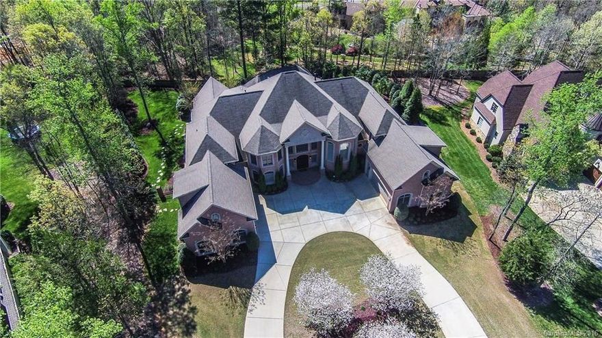 Magnificent Home w/ Attention to Every Detail! Spacious & Grand, w/ Formal LR, Cozy Sitting Rooms, 3 Fireplaces, Chef's Kitchen, Media Room, Ornate Ceilings, Master on Main, Large Laundry on Main, Huge Master Suite on Second, w/ Expansive Closet and Additional Laundry, Stunning Back Yard with Gunite Salt-Water Pool, Water Fall, Guest Suite, Gourmet Outdoor Kitchen & Outdoor Fireplace, Spacious Porches, Two (2)-Car Garages. Home Feels Like True Estate Living With All The Amenities of a Community!