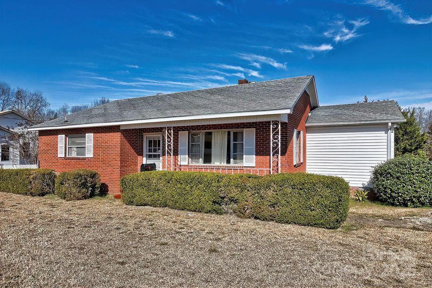 Welcome to 321 E Sewell Street. A cute 3 bedroom /  2 bath  all brick home situated on a corner lot only 2 minutes from the Town of Pageland. Primary bedroom has a spacious walk in closet and master bath with walk in shower and seperate tub. The kitchen offers lots of cabinetry and appliance remain. The family room allows for lots of guest. There is a workshop  /  2 car garage in the back yard. Perfect for a hobby shop. There is also additional storage space. The front yard has crepe myrtles and other shrubs.