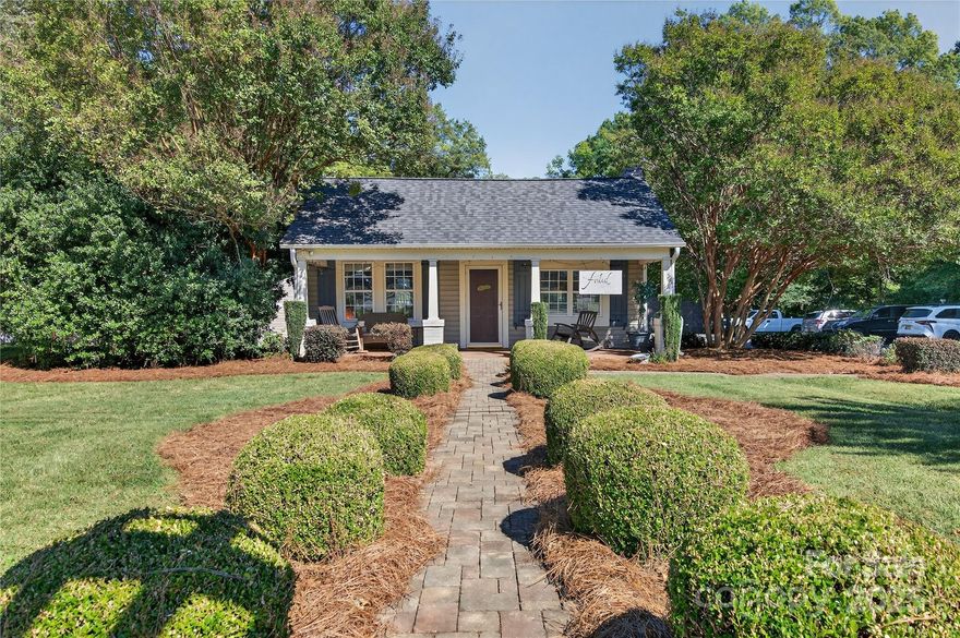 Historic feel in this charming home one one acre in Cornelius! Complete with a white picket fence out front! Bring your rocking chairs and move right into this 3 Bedroom, 1.5 Bath home! The hardwood floors throughout, heavy moldings and tin ceilings that add to the character of the living space. Enter into the spacious Living Room w/ vaulted ceiling and a fireplace. There is a dedicated Dining Room and a fully Renovated Kitchen with beautiful wood cabinetry, granite countertops and complementing tile backsplash & stainless steel appliances. Separate mud room with half bath, inside Laundry in the primary suite. Large deck, XL detached garage with room for 4 cars, separate storage building and covered RV Parking! There is also a detached studio with 2 Bedrooms and a full Bathroom on the property! Neighborhood Mixed Use Zoning allows for both residential and commercial uses, with endless possibilities in this growing region. Great opportunity for Live-Work or your next business venture!