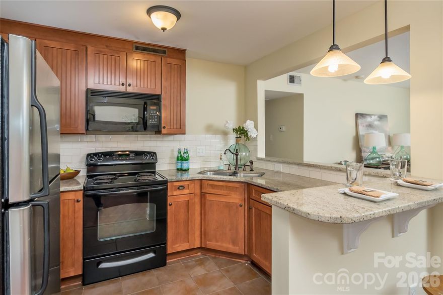 Perfect location!! Walk to Montford area. Hop-skip-jump to South Park, vast restaurants, coffee shops & multiple grocery stores all in walking distance. Granite countertops & tiled floors in kitchen AND baths! Hardwood & LVP floors, exposed brick, tiled backsplash & dining opens to terrace facing the courtyard! In unit stacked Washer/Dryer. Community Pool.