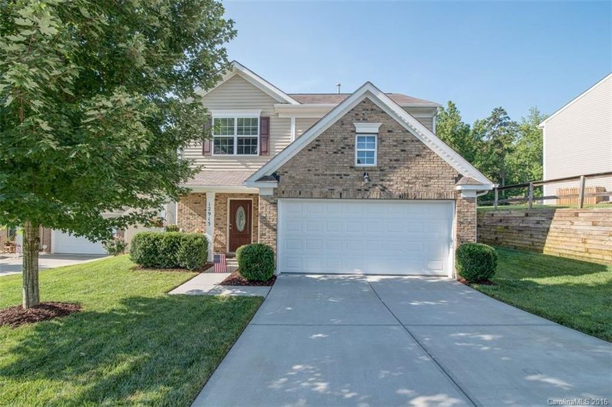 Impeccably maintained home located in a quiet cul-de-sac.  Picturesque private lot that backs up to mature wooded area.  New engineered hardwood floors welcome you into the spacious foyer, and continue into living room and kitchen.  You will never feel left out of the party in this wonderfully open home!  Custom backyard patio complete with pergola and fire pit, perfect for entertaining!  New carpet upstairs!  Garage is a gear head's dream with cabinets, workbench, and finished floor.