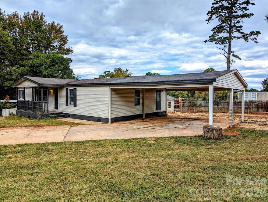 Location! Location! Location! close to exit 41 of I-485, with easy access to Albemarle Rd. Parking space is abundant, with plenty of room for cars, trailers, trucks, equipment, etc. Conveniently located at the end of a cul-de-sac, access in and out of the property is a huge plus!