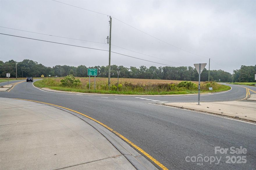 Discover a rare opportunity at the intersection of Sikes Mill, Tom Helms, Love Mill, and E Lawyers Rd, aka "Five Forks" in the town of Unionville by way of Monroe, NC; an area poised for growth! This residentially zoned property is strategically noted in the Unionville land use plan as a future commercial hub, making it a possible investment for visionary developers. Located just north of the new 74 bypass and within proximity to Piedmont Schools, this parcel benefits from high traffic flow and easy access to neighborhoods. Utilities, including water and natural gas, are readily available in the area. Additionally, the nearest sewer line on Loxdale Farms Dr may offer potential access for development. Don’t miss your chance to capitalize on this centrally located gem in a rapidly evolving market. Buyer to verify all utilities and zoning specifics. Act now to secure your stake in the future of Five Forks!