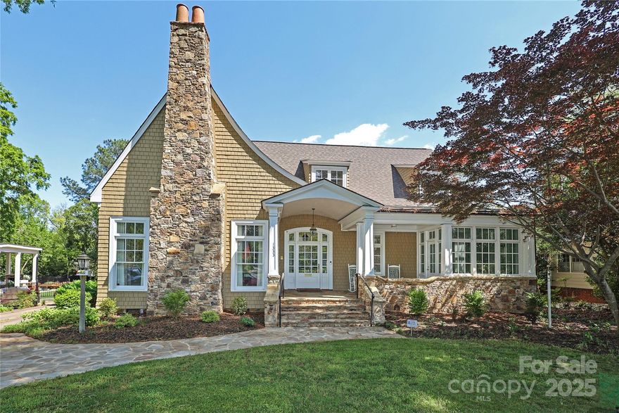 Beautifully updated home in Historic Dilworth! Refinished Brazilian hardwoods throughout the main level, which includes a formal living room with a 12-foot, coffered ceiling and formal dining room. A large, eat-in chef's kitchen has top of the line appliances, custom cabinets, walk-in pantry, and opens to a spacious den with a dry bar and built-in cabinets. French doors lead to a newly renovated outdoor area. First floor primary suite with his-and-her walk-in closets and a fully updated spa like bathroom. New roof in 2023 and main-level HVAC system in 2022. Brand new upstairs carpet, whole-house water filtration system, fresh paint inside and out, Tesla charger, new epoxy flooring in both the oversized two-car garage and the HUGE basement garage workshop. Tons of storage throughout including walk-in, two story attic with built-in shelves. Separate living quarters with full kitchen over the garage. With too many updates and unique features to list, this home is a must see!