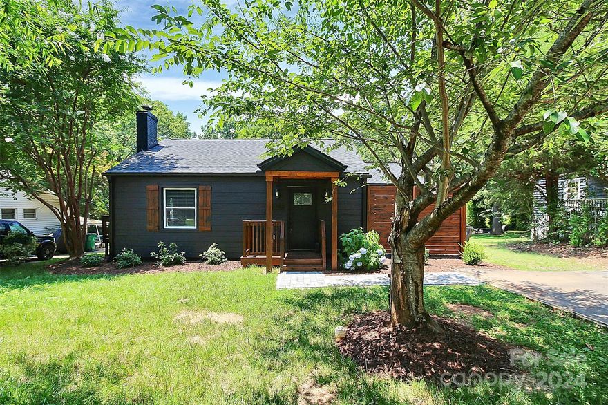 Walking distance to Revolution Park and just minutes to South End!  Cute as a button 3 bedroom 2 bath beauty featuring new roof, exterior, gutters, fascia, soffit, and windows.  HVAC and ductwork less than 3 years old.  Kitchen features modern granite, tiled backsplash and stainless steel appliance package.   Private porch with pavers off of the kitchen perfect for al fresco dining.  Open living room with tiled gas fireplace. Primary bedroom stuns with ensuite bathroom tiled shower and stand alone soaking tub. Large flat and fenced back yard w/ storage building that matches the home and fire pit for entertaining!  Just bring your furniture. You do not want to miss this one!