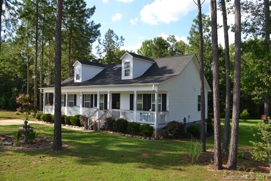 Unique in its own way, this lovely ranch home is surely to impress! Extended front porch ideal for rocking chairs and sweet tea!  Vaulted great room, open layout, roomy kitchen has it all!  Trey ceiling in master bedroom w/ a good size master bath. Great lawn and a back deck overlooks private view! Large lot is 1.62 acres perfect for country living.