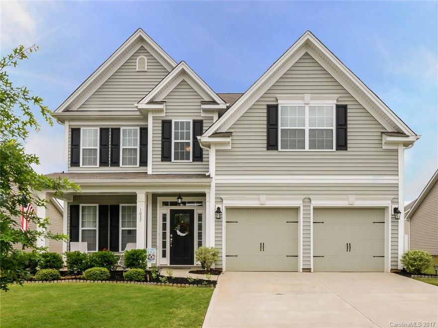 Prepared to be impressed with this like new 5 br/3ba home in highly desirable community! Upgrades throughout, coiffured ceiling in dining room/office, hardwoods mostly throughout main level, tile backsplash in kitchen, tile floors in bathrooms and laundry, extended height vanities, and more!!  Bedroom and full bath on main level- perfect for inlaw suite. Enjoy those SC sunsets on the extended paver patio in rear with the privacy of a fenced back yard! This will not last long!!